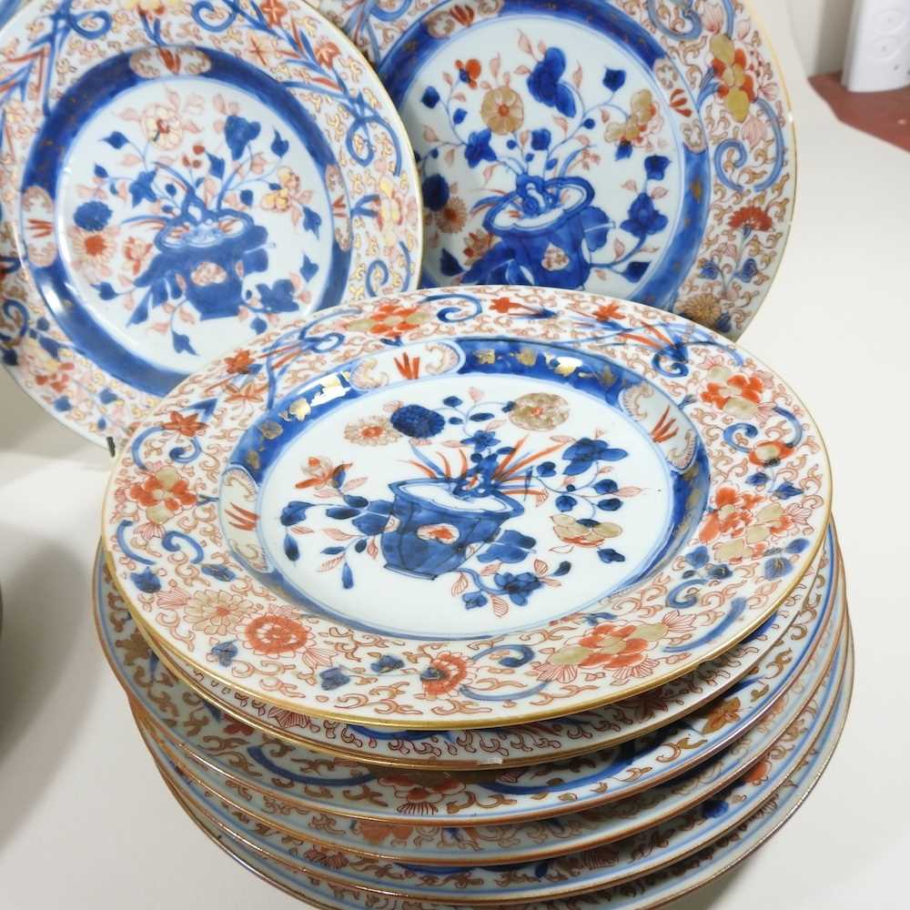 A collection of twelve 18th century Imari porcelain plates, each decorated with still life subjects, - Image 3 of 12