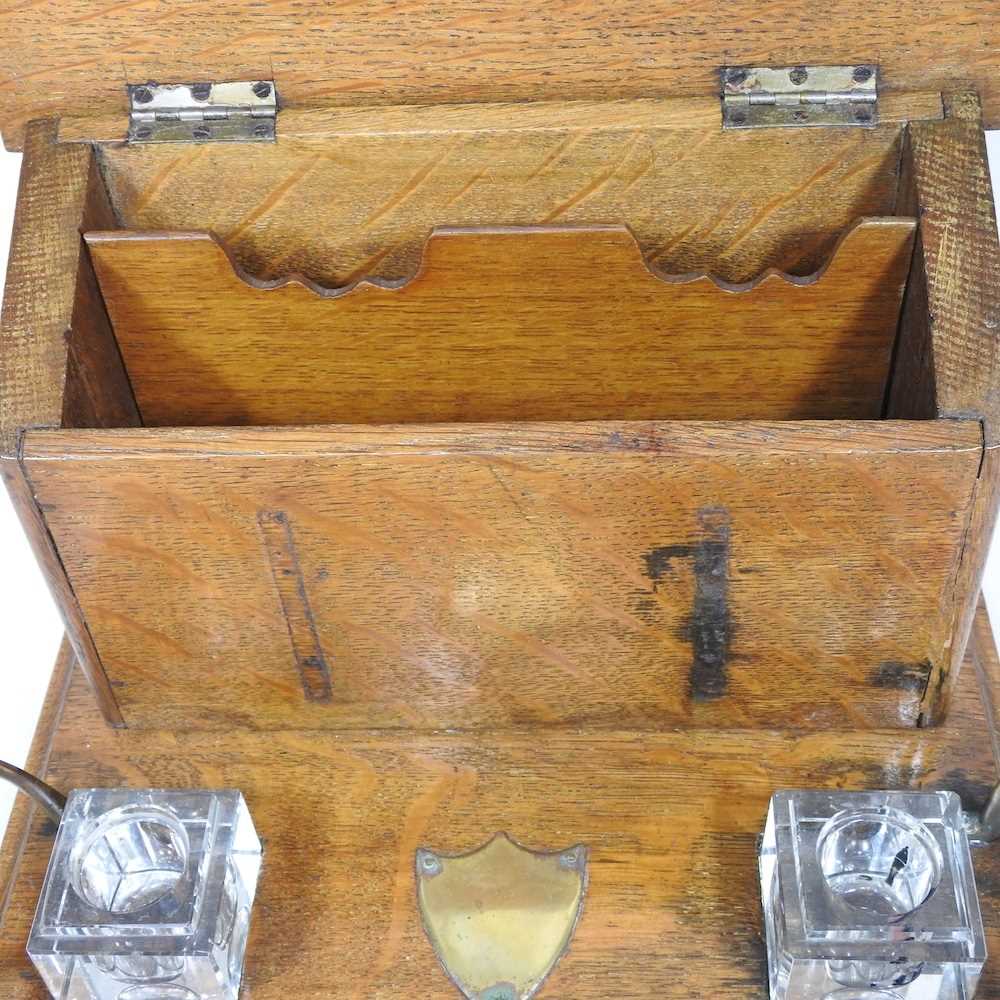 An early 20th century brass mounted oak desk stand, 31cm wide - Image 3 of 4