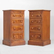 A pair of hand made burr and featherbanded walnut bedside chests, each containing four drawers (2)