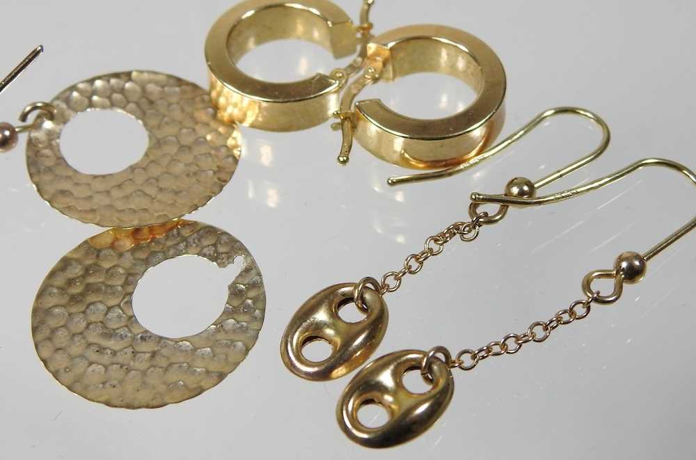 A pair of 9 carat gold cuff earrings, 1.8g, together with two other pairs of pendant earrings (3) - Image 2 of 2