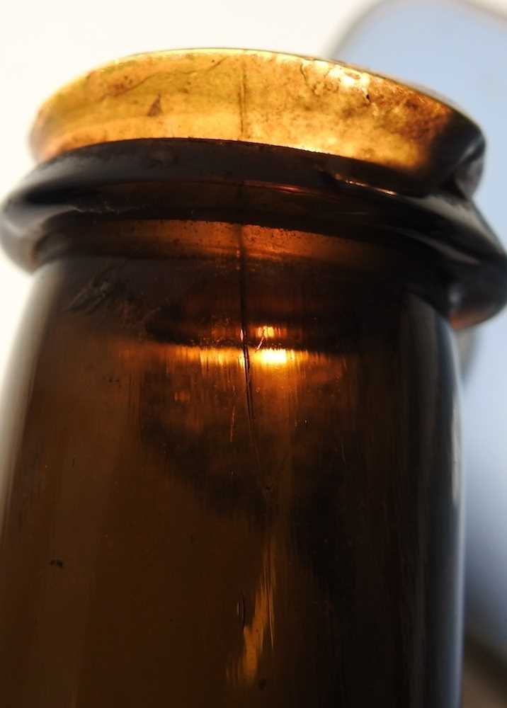 An 18th century English brown glass sealed wine bottle, inscribed All Souls Coll:C:R, 26cm high - Image 7 of 15