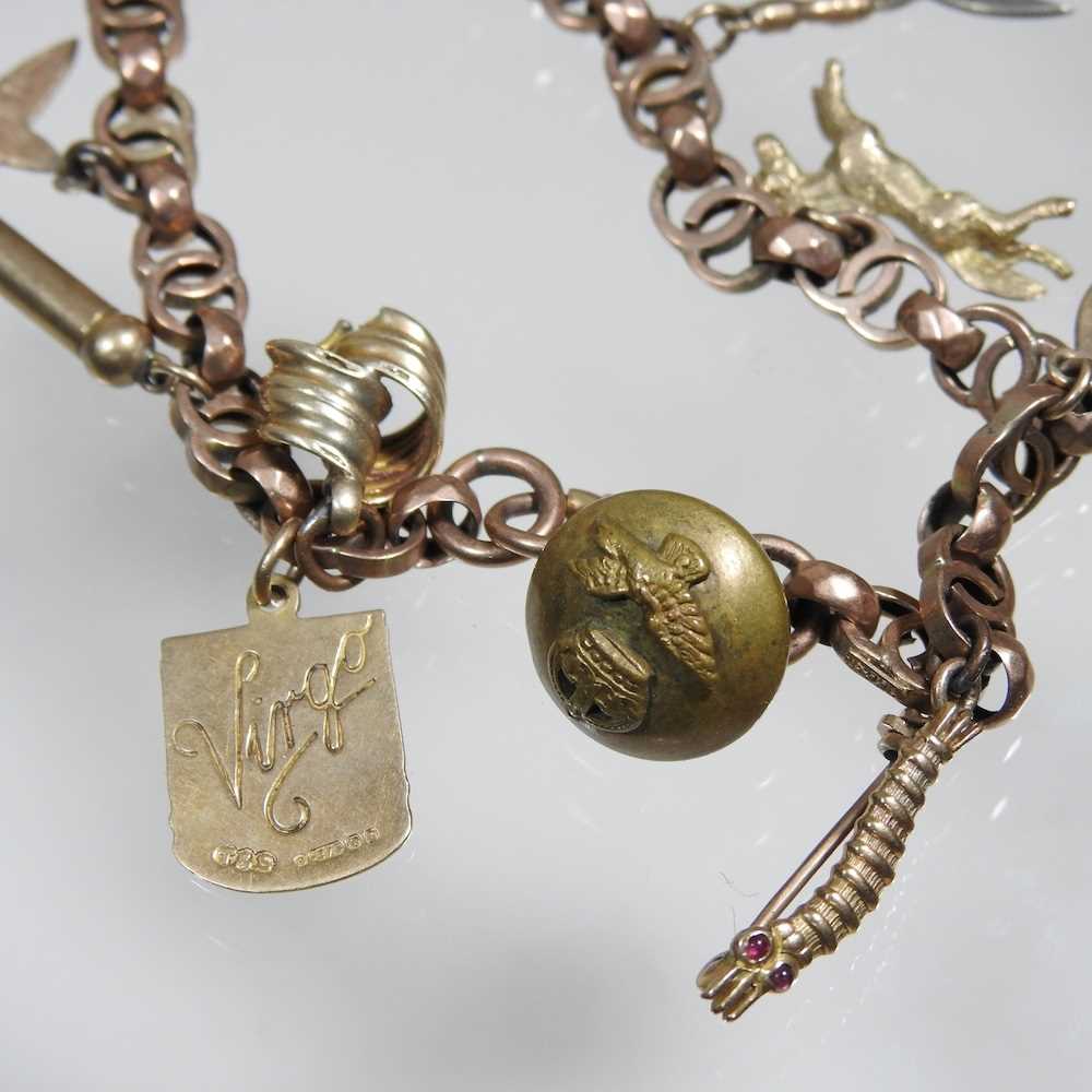 An early 20th century charm bracelet, suspended with a collection of twelve various novelty - Image 6 of 9