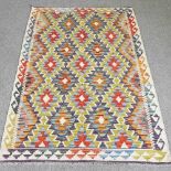 A kelim rug, with all over geometric designs, 162 x 107cm