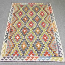 A kelim rug, with all over geometric designs, 162 x 107cm