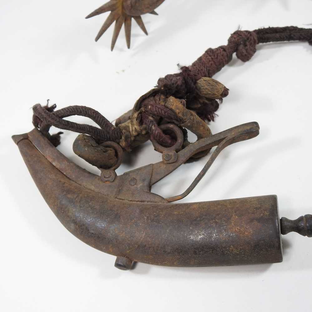 A pair of antique iron spurs, together with a 19th century powder flask (2) - Image 3 of 3