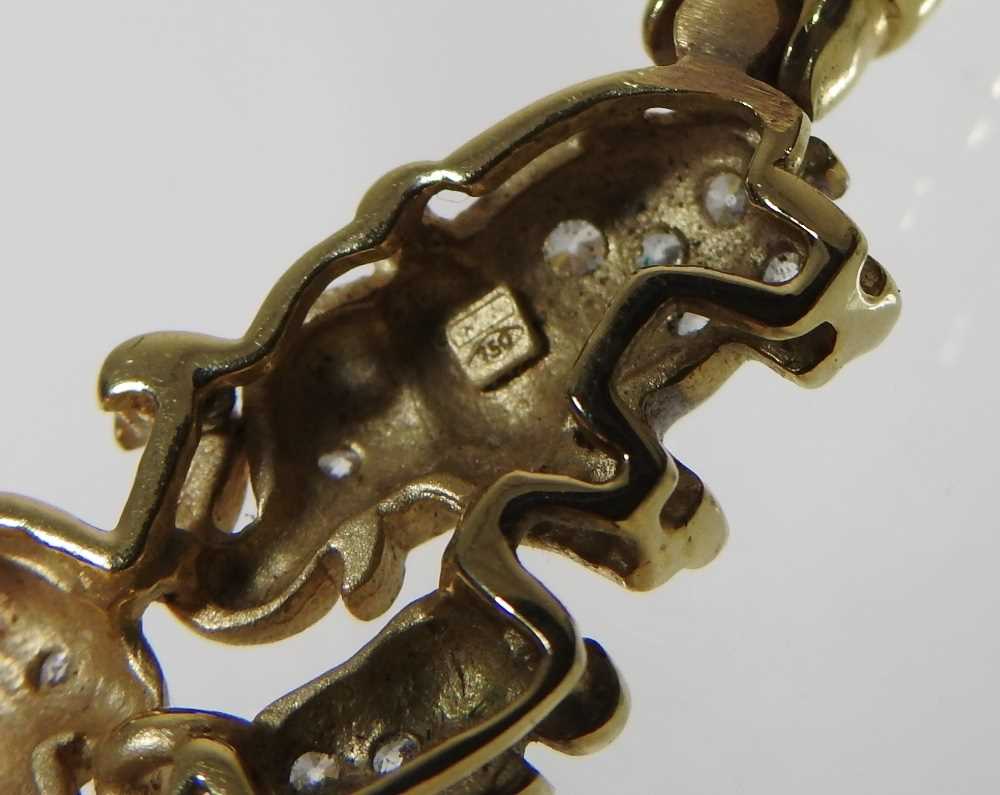 A fancy link necklace, suspended with three elephants, each set with zircons, marked 750, 20g, - Image 2 of 5