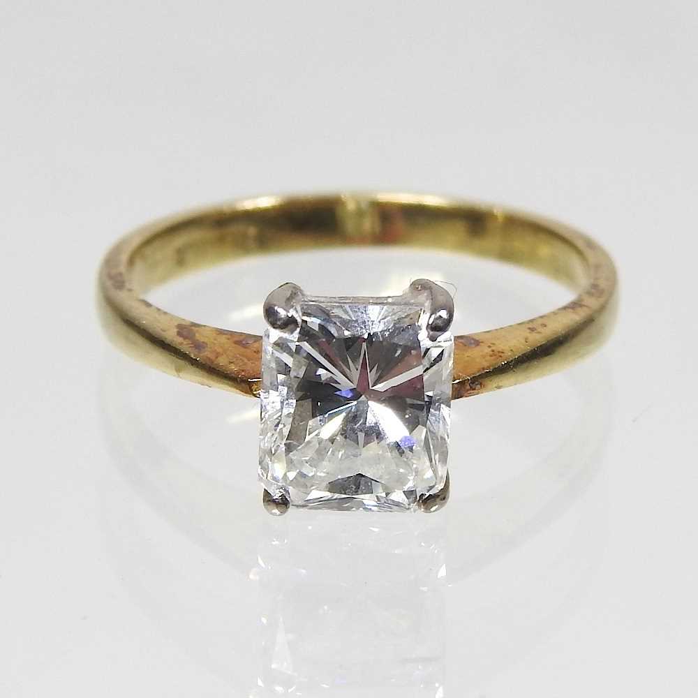 An 18 carat gold princess cut solitaire diamond ring, approximately 1.75 carats, 2.2g, size K,