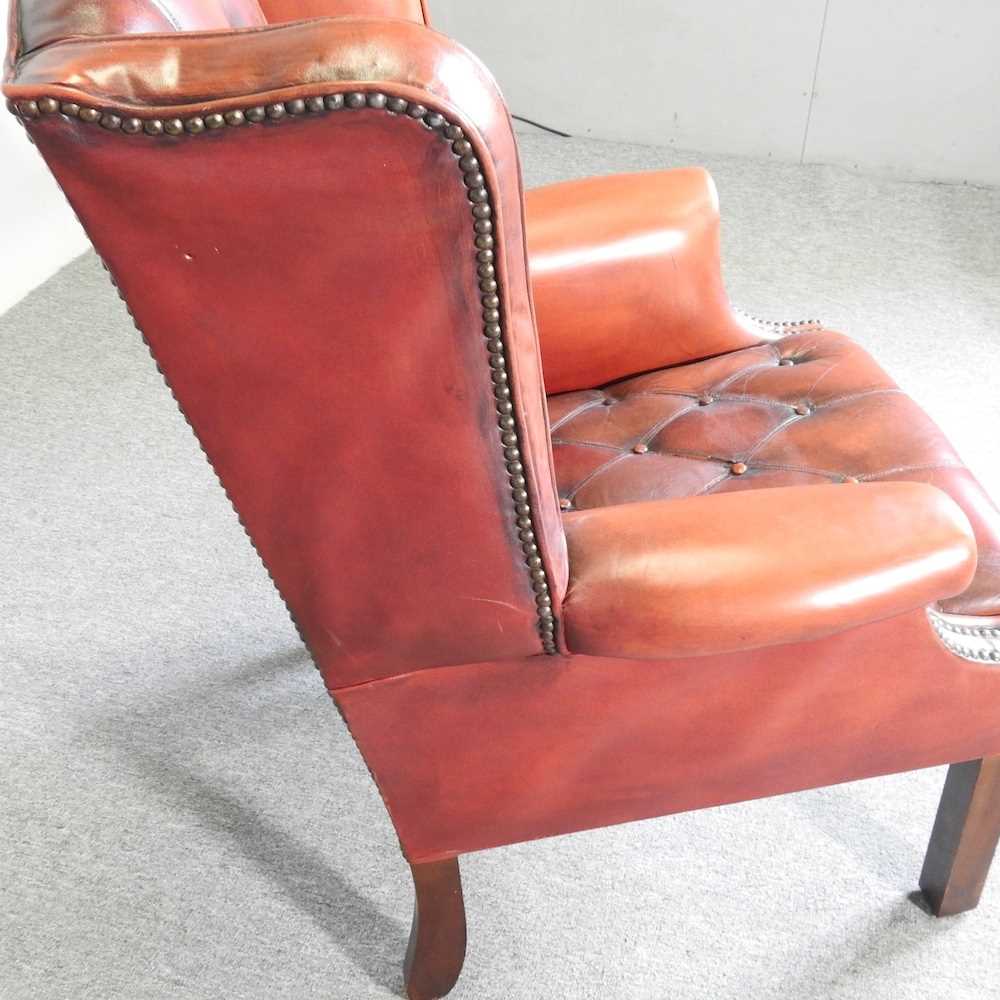 A Georgian style leather upholstered button back wing armchair, mid 20th century, on square legs - Image 4 of 6