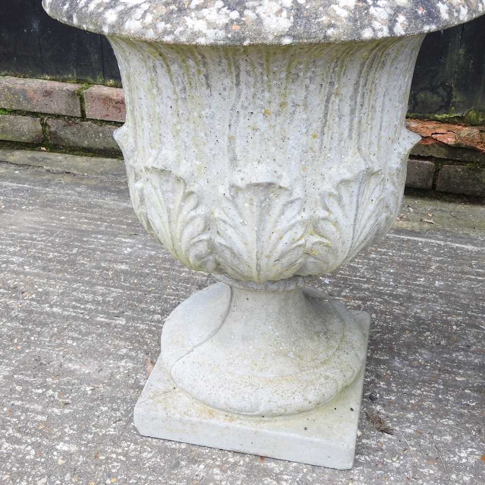 A pair of cast stone garden urns, of pedestal form, 57cm high (2) - Image 3 of 4