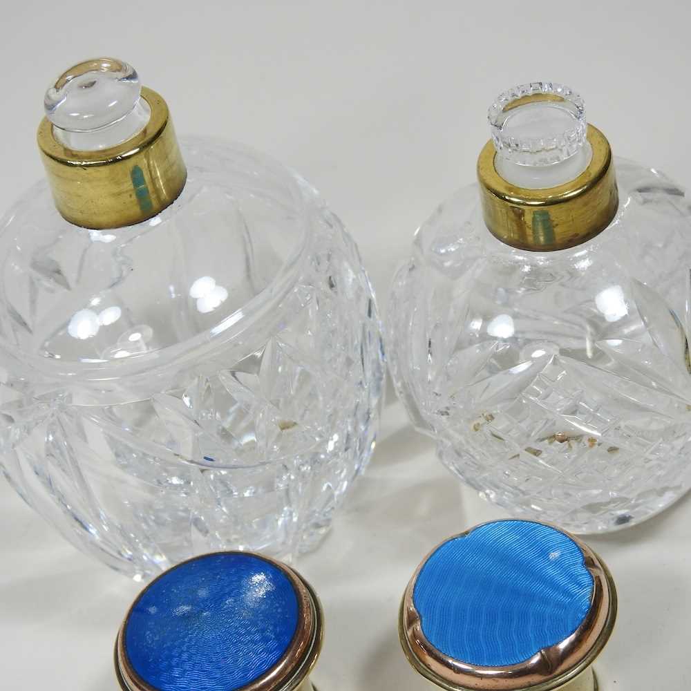 A cut glass scent bottle, with a gilt and blue enamel cover, 12cm high, together with another - Image 5 of 6