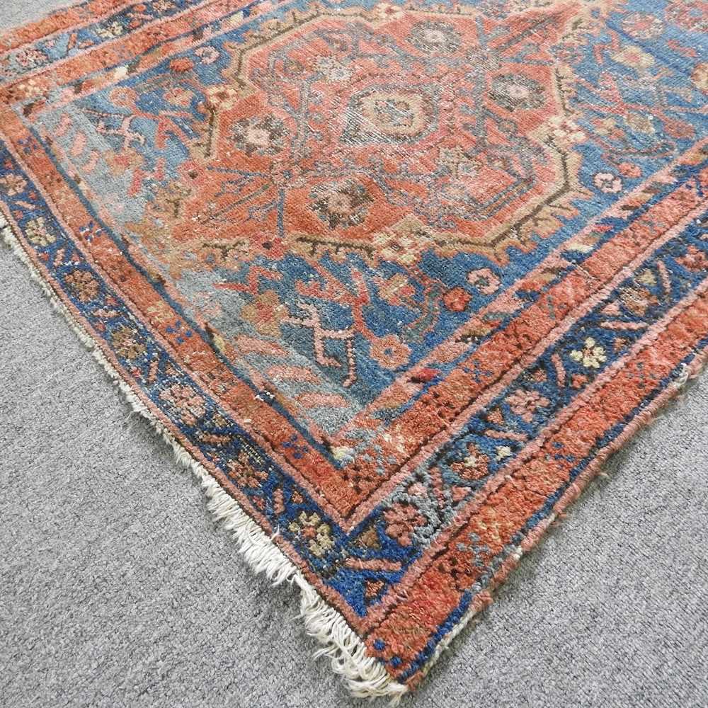 A malayer runner, with flowerhead designs, on a blue ground, 237 x 96cm - Image 3 of 5