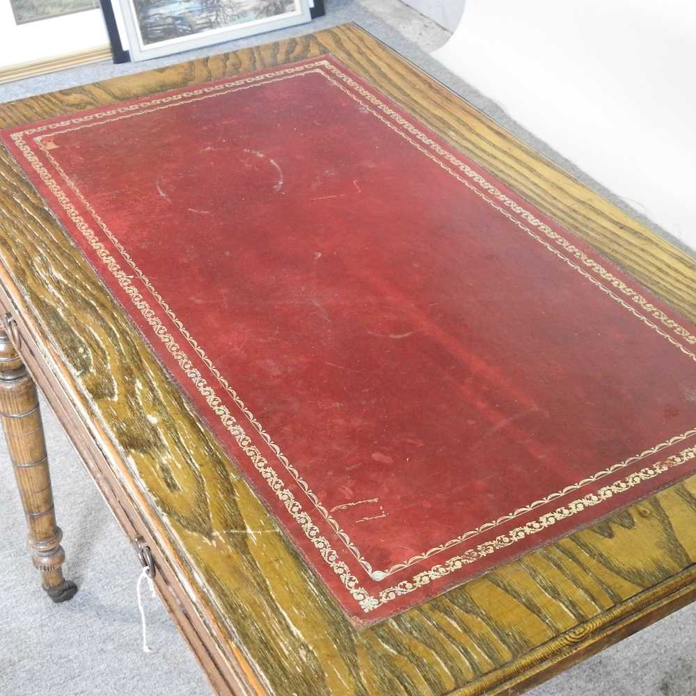 A late 19th century oak writing table, with an inset top, by Waring & Gillows 92w x 58d x 74h cm - Image 4 of 7