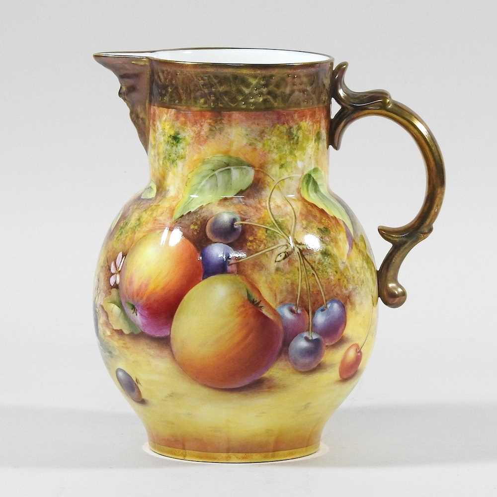 A Royal Worcester porcelain jug, hand painted with a fruit study by Paul English, signed, printed