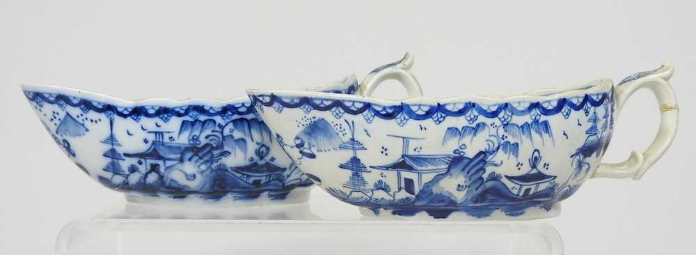 A pair of 18th century Staffordshire blue and white sauce boats, circa 1790, each painted with - Image 4 of 10