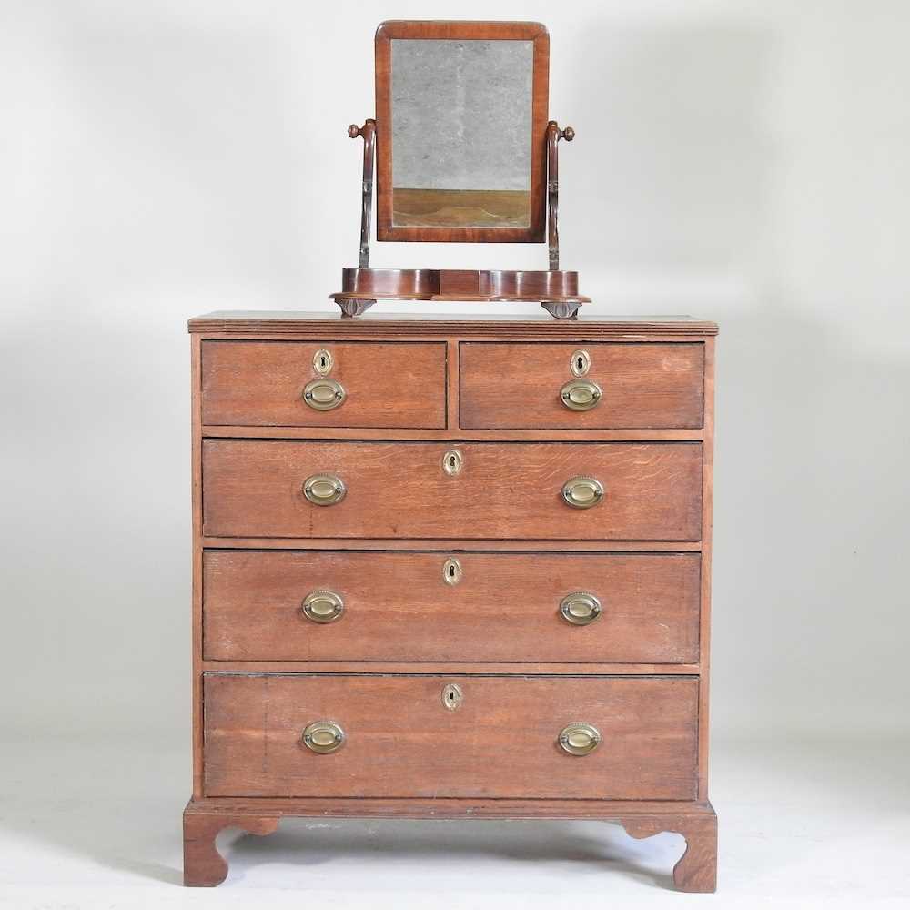 A George III oak chest of drawers, together with a Victorian mahogany toiletry mirror (2) 93w x
