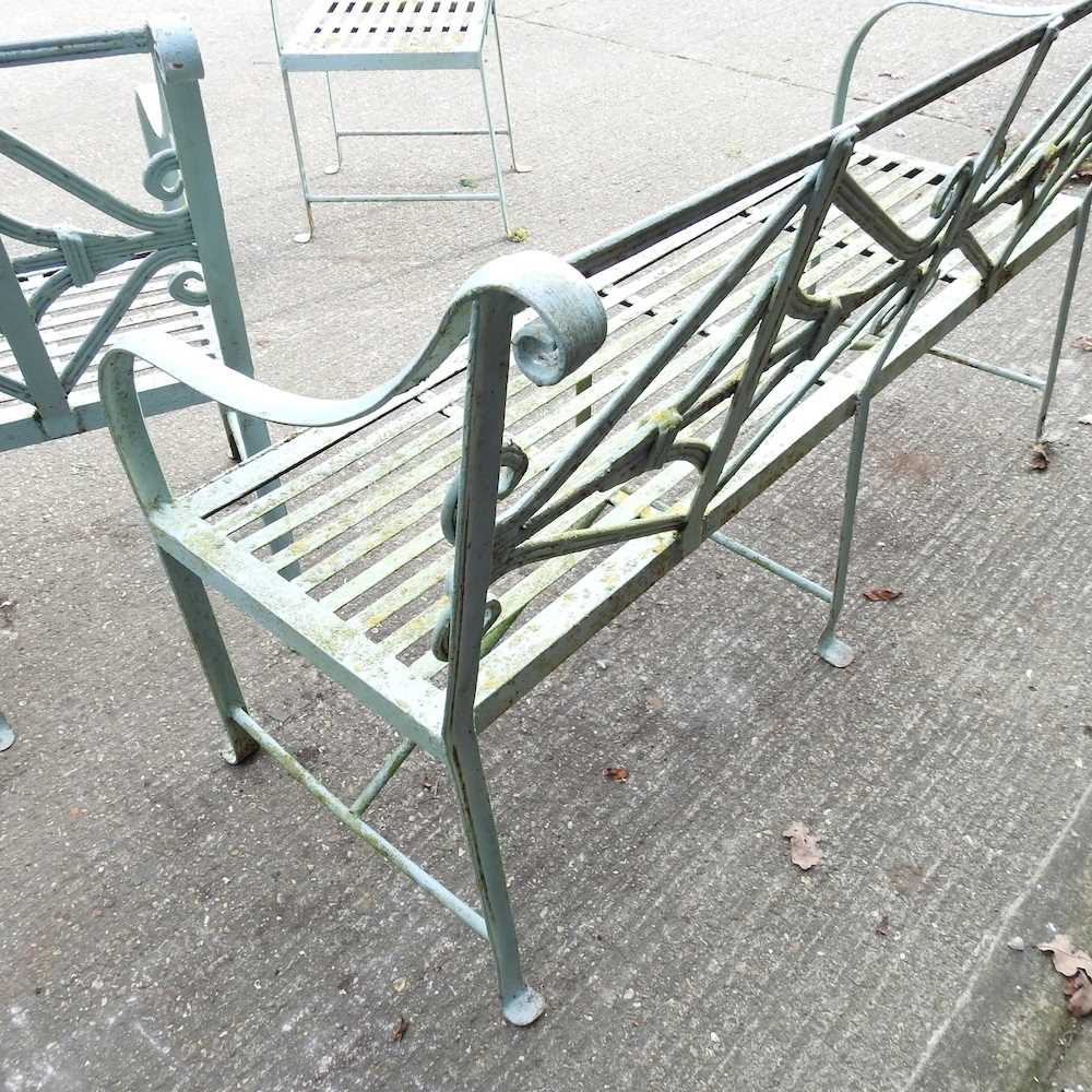 A Regency style cast iron garden set, with a strapwork back, comprising a bench and a pair of - Image 2 of 5