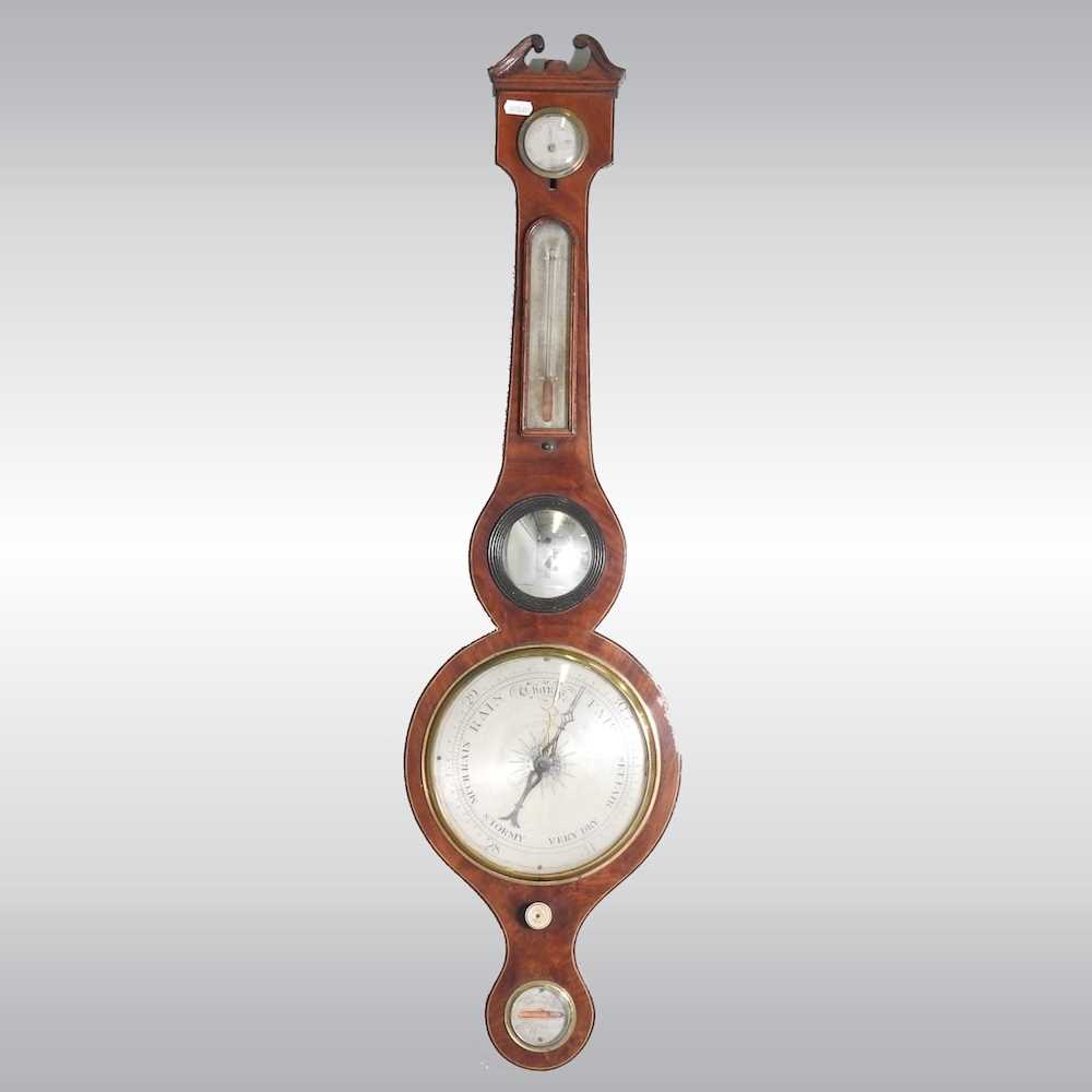 A 19th century mahogany cased wheel barometer, with boxwood and ebony stringing and silvered eight