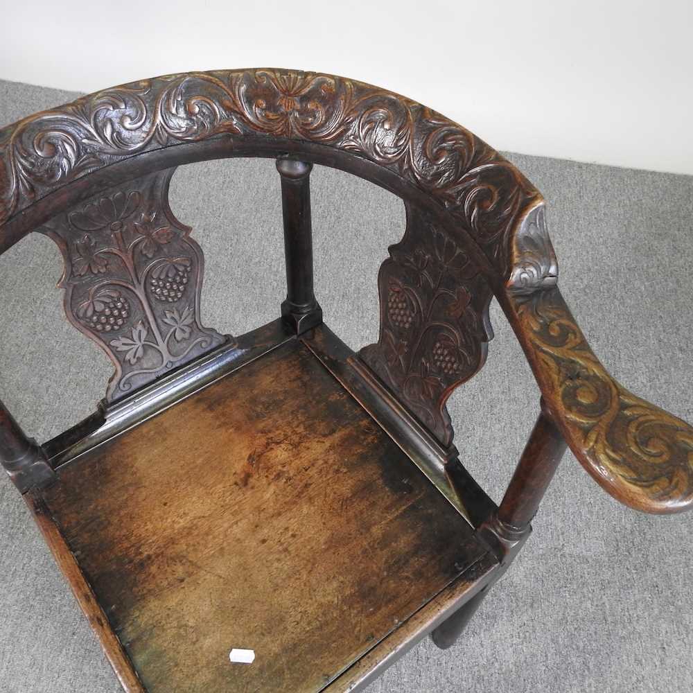 A George III and later carved oak corner chair - Image 4 of 4