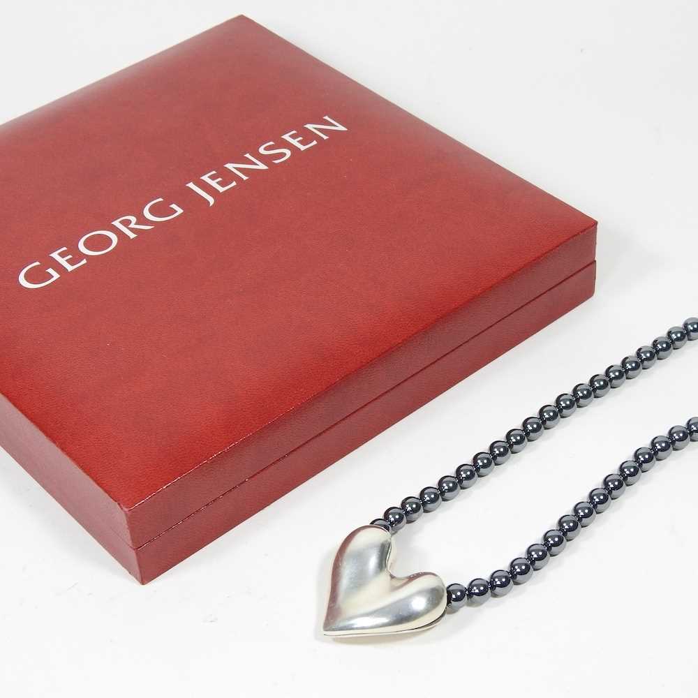 A Georg Jensen silver and hematite bead necklace, suspended with a silver heart shaped pendant, 38mm