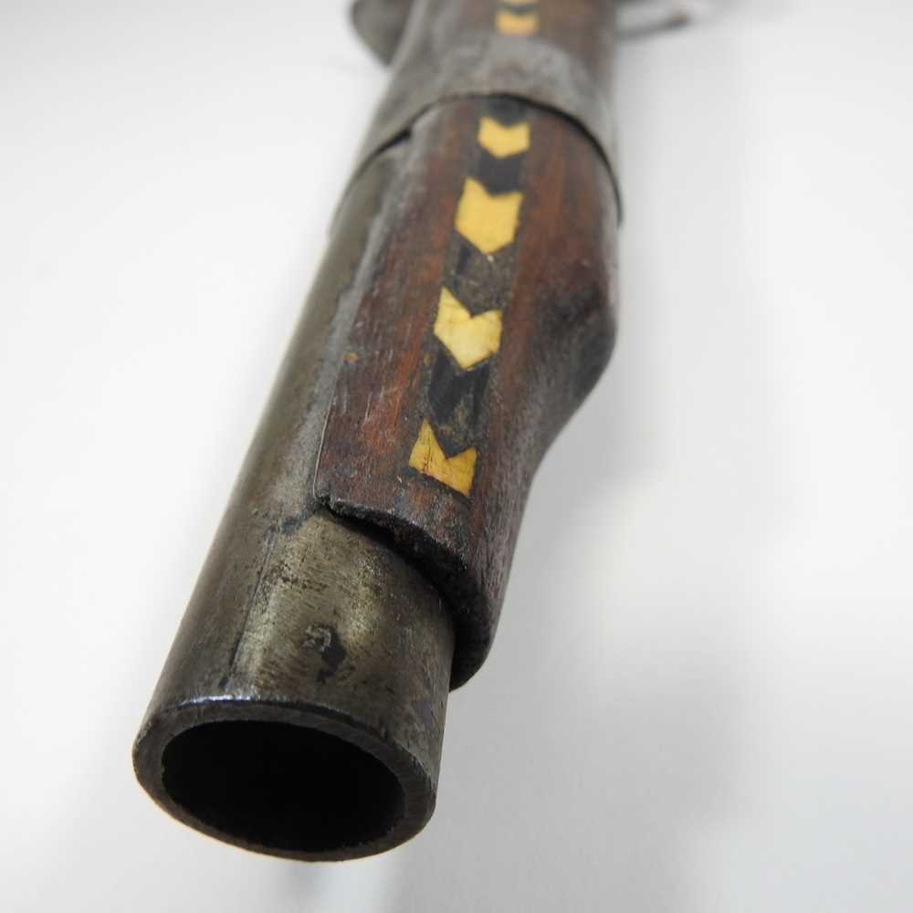 A middle Eastern flintlock pistol, with bone inlay, 40cm long Overall condition is complete. It is - Image 8 of 8