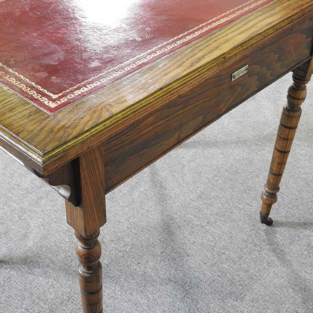 A late 19th century oak writing table, with an inset top, by Waring & Gillows 92w x 58d x 74h cm - Image 7 of 7