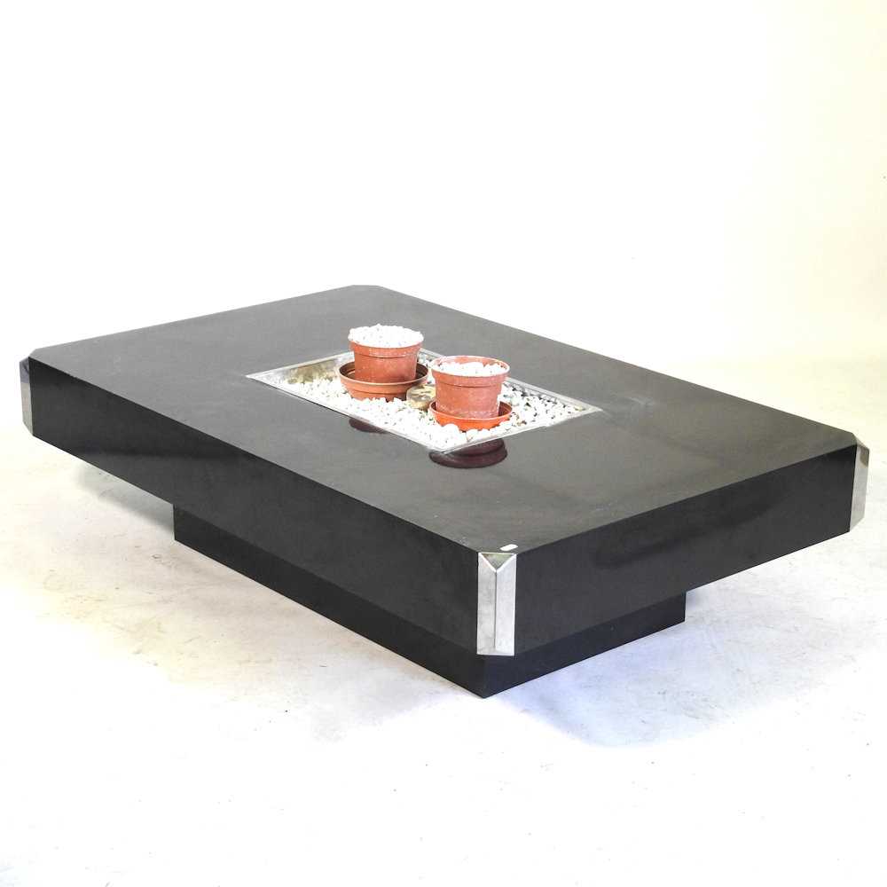 An Italian black formica Alveo coffee table, circa 1970's, by Willy Rizzo for Mario Sabot, of