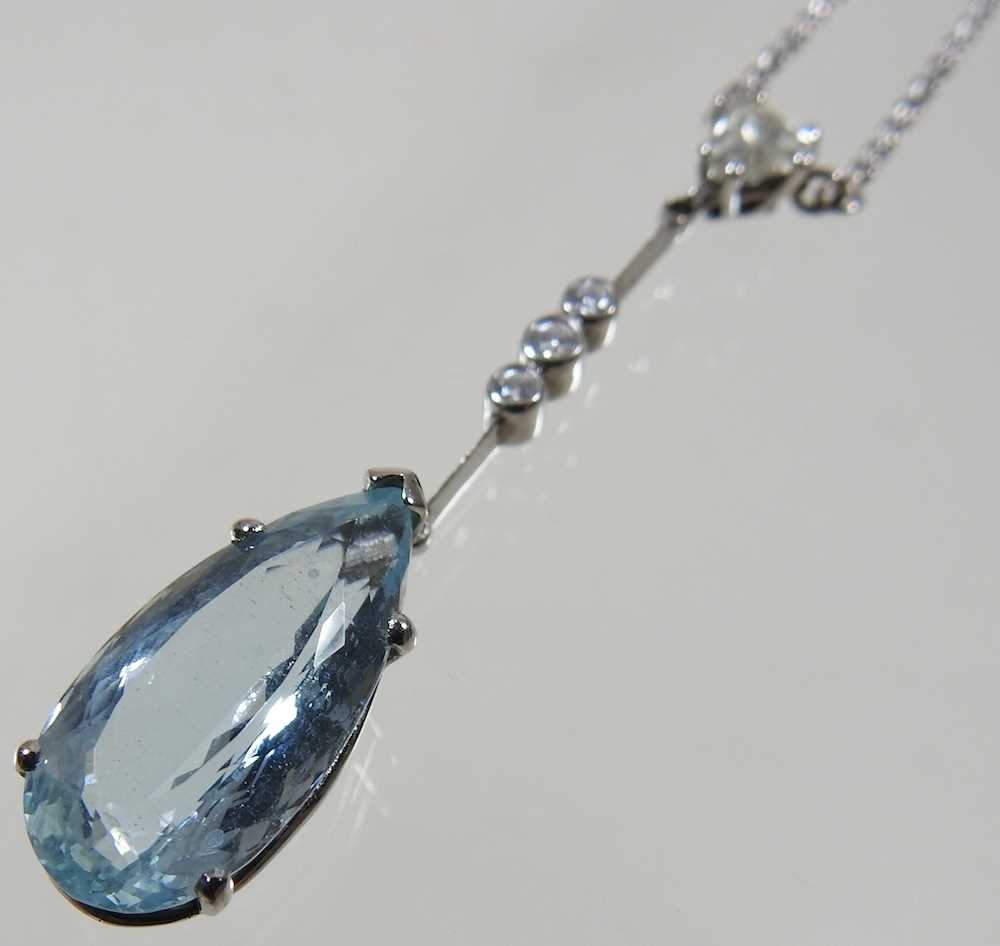 An 18 carat gold aquamarine and diamond pendant necklace, the pear shaped cushion cut stone weighing - Image 2 of 9