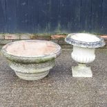 A cast stone garden urn, 41cm high, together with another (2)