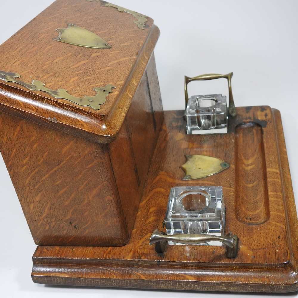 An early 20th century brass mounted oak desk stand, 31cm wide - Image 4 of 4