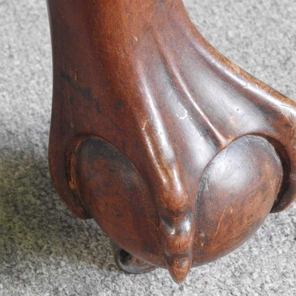 An early 20th century wind out extending dining table, of oval shape, on a claw and ball feet, - Image 6 of 8