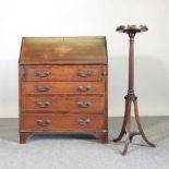 An Edwardian mahogany and inlaid bureau, together with a jardiniere stand, on a splayed base (2) 76w