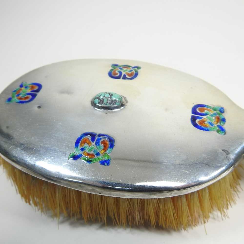 An Edwardian silver hand mirror, 28cm long and brush, 24cm long, each inset with a Ruskin style - Image 2 of 14