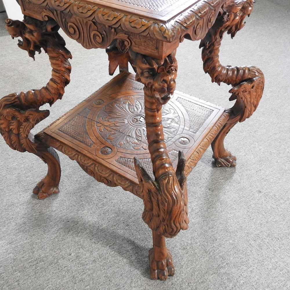 An early 20th century Italian carved walnut centre table, of Renaissance revival design, on four - Image 5 of 5