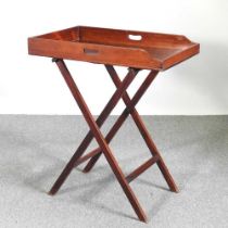A 19th century mahogany butler's tray, on a folding stand 74w x 48d x 90h cm