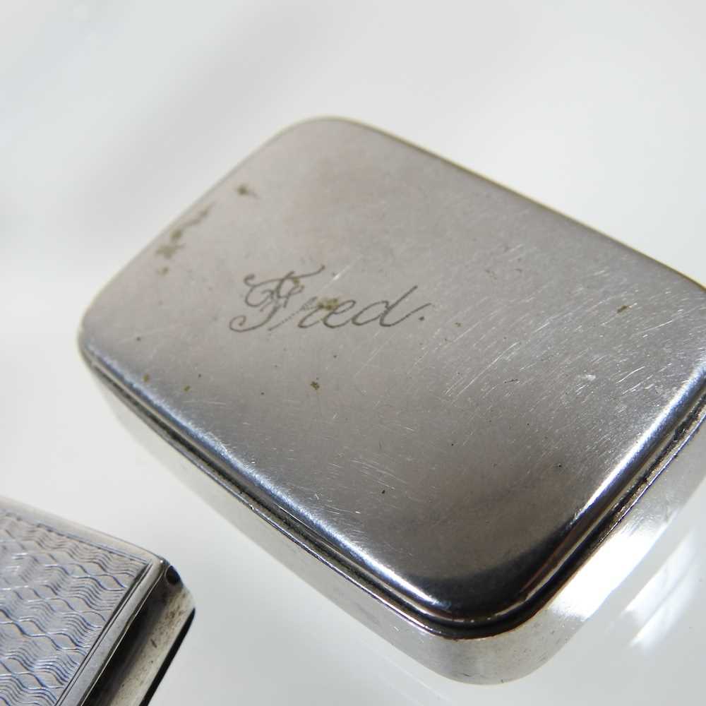 A Victorian silver oval snuff box, with a hinged lid, London 1870, 5cm wide, together with an - Image 3 of 5