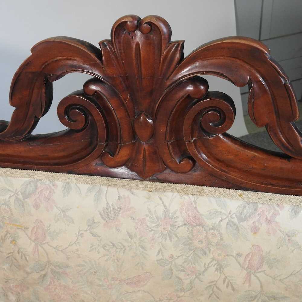 A 19th century carved mahogany double ended couch, upholstered in cream, on turned legs 210w x 56d x - Image 5 of 11