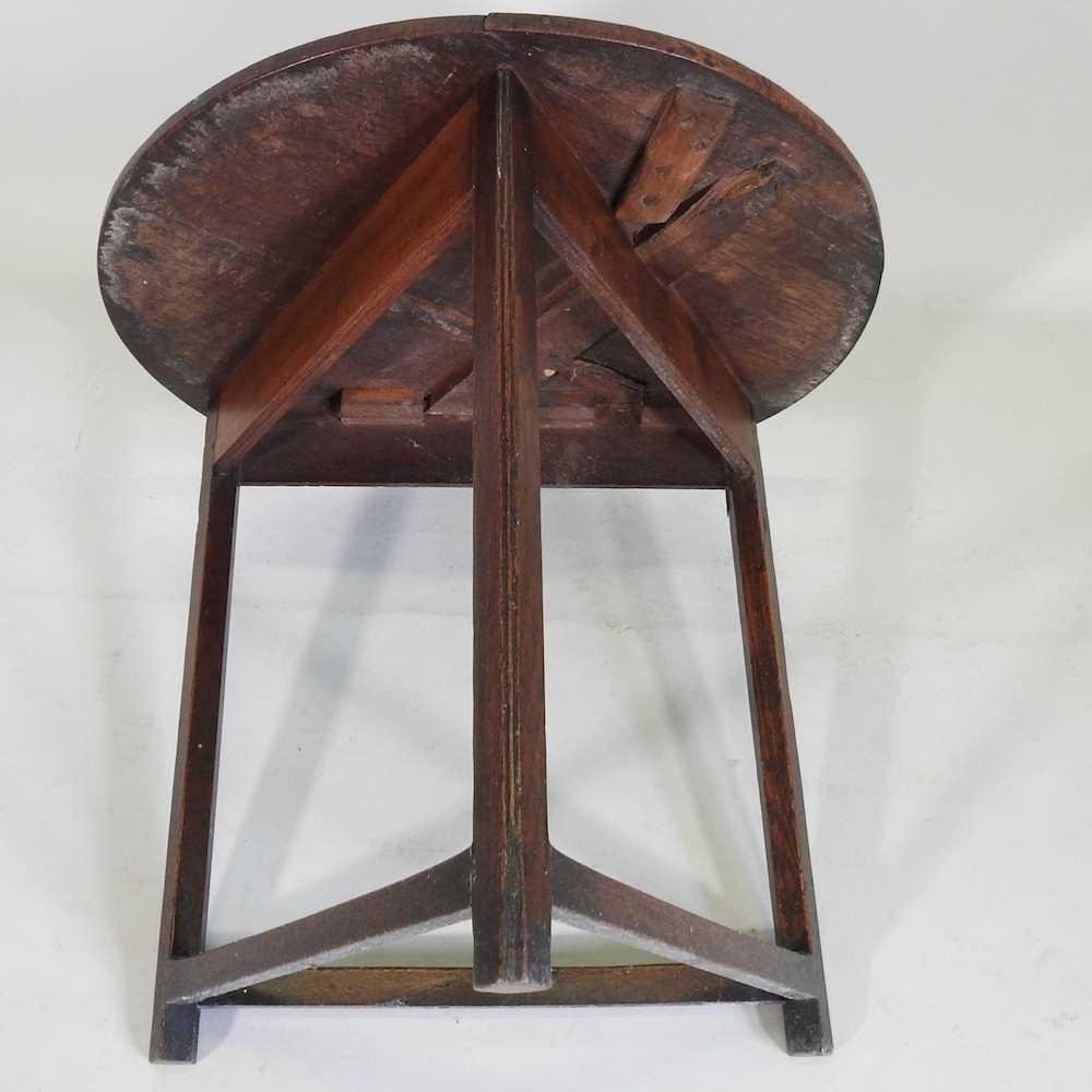 A 19th century and later oak cricket table, with a circular top, on a splayed base 74d x 68h cm - Image 8 of 9