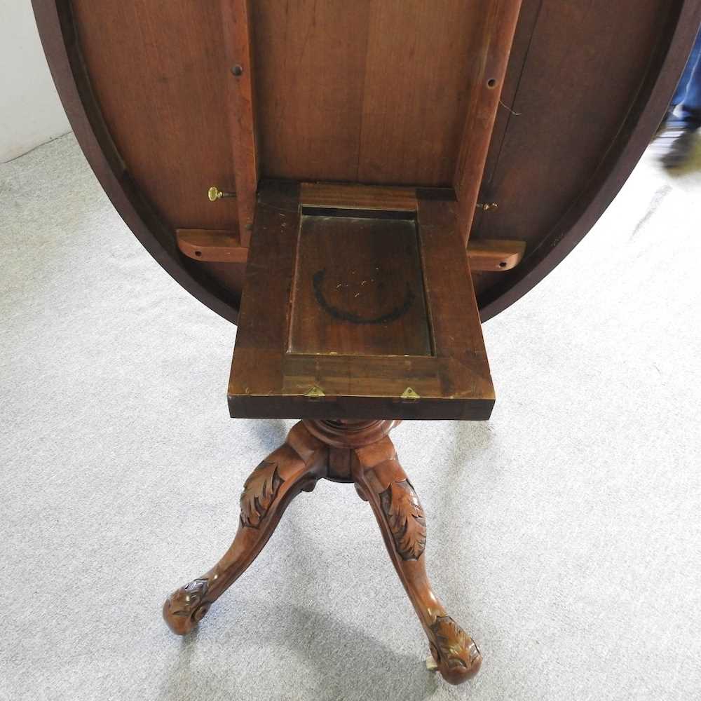 A Victorian burr walnut breakfast table, with a hinged oval top, on a quadruped base 136w x 102d x - Bild 4 aus 4