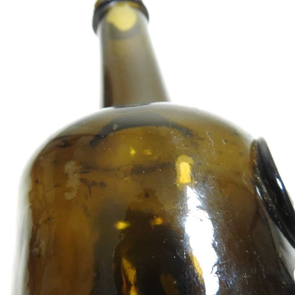 An 18th century English brown glass sealed wine bottle, inscribed All Souls Coll:C:R, 26cm high - Image 6 of 15