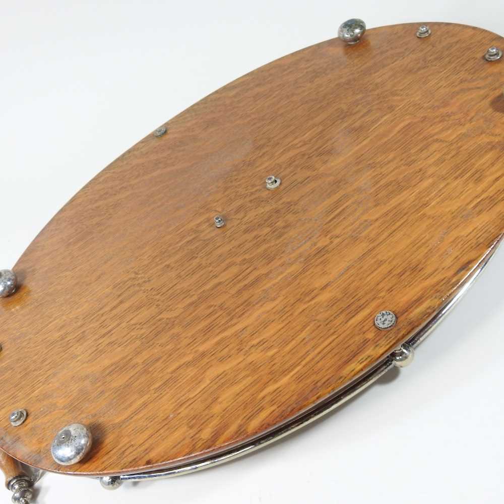 An early 20th century light oak serving tray, with silver plated mounts, 57cm wide, together with - Image 5 of 5