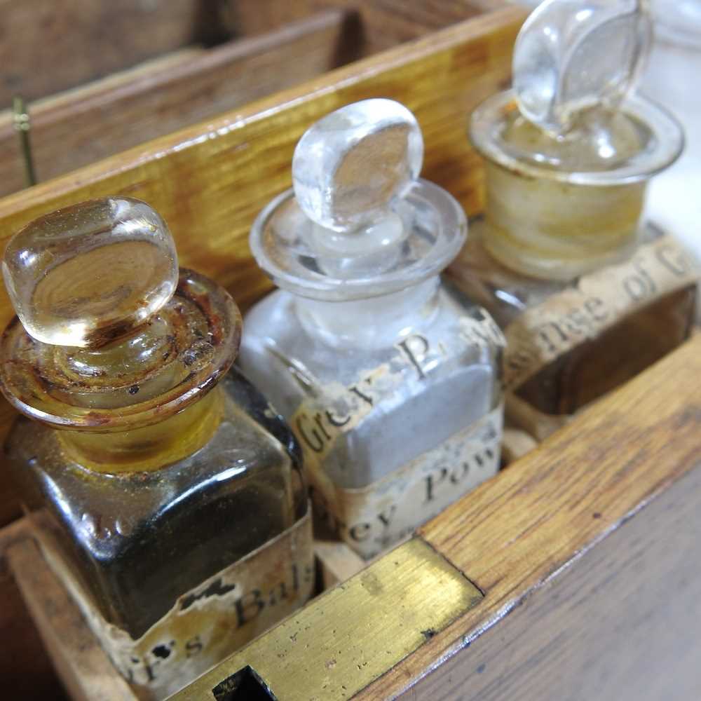 A 19th century oak cased apothecary box, the fitted interior containing labelled glass medicine - Image 4 of 13
