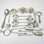 An early 20th century silver three piece condiment set, together with a collection of silver and