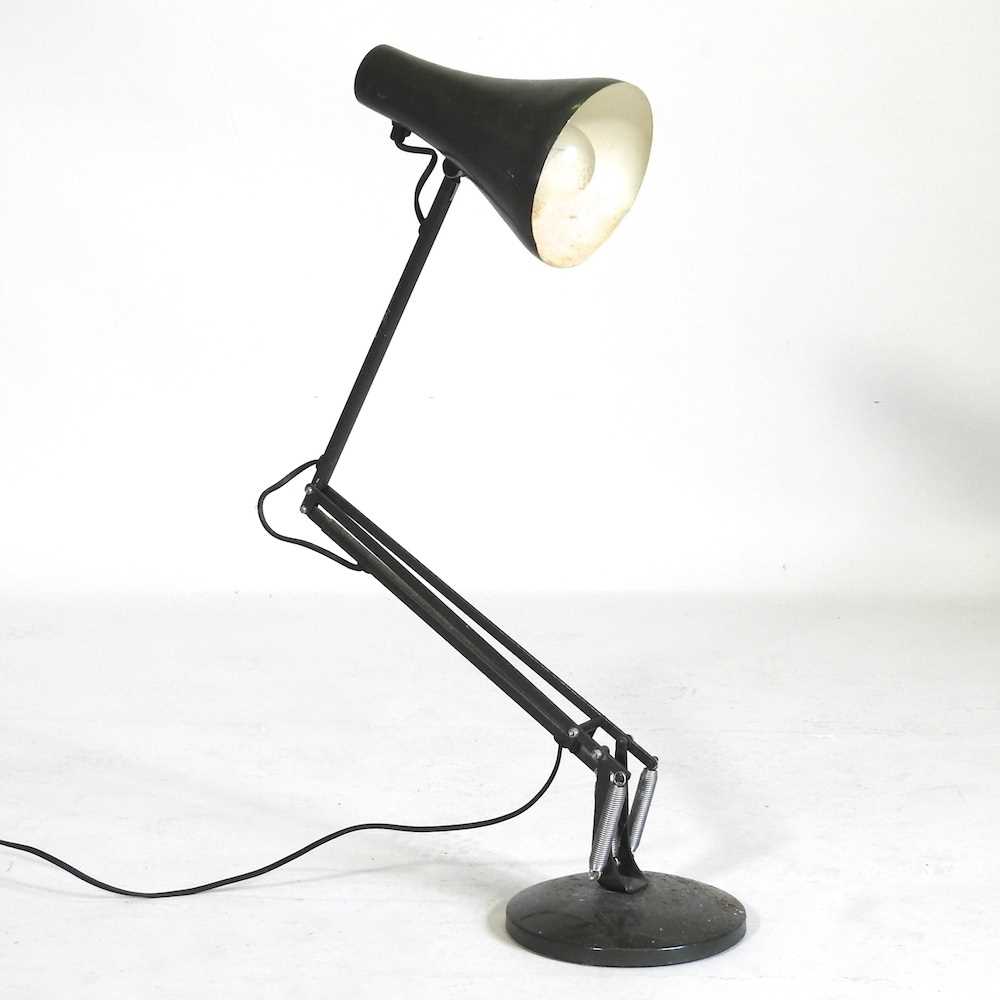 A 1970's green anglepoise table lamp, in the style of Herbert Terry