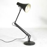 A 1970's green anglepoise table lamp, in the style of Herbert Terry