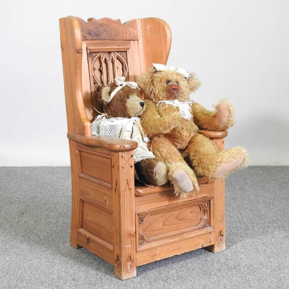 A carved pine child's chair, together with a Changle plush teddy bear, Cecilia, 42cm high and a