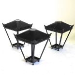 A set of three black painted metal garden lanterns, each 51cm high (3)