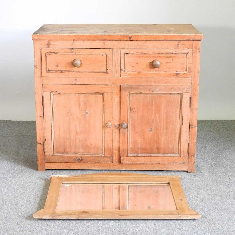 A pine dresser base, together with a pine wall mirror (2) 107w x 59d x 92h cm