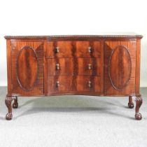 An early 20th century mahogany sideboard, on claw and ball feet 150cm wide