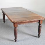 A Victorian mahogany wind-out extending dining table, on turned legs 209w x 103d x 67h cm