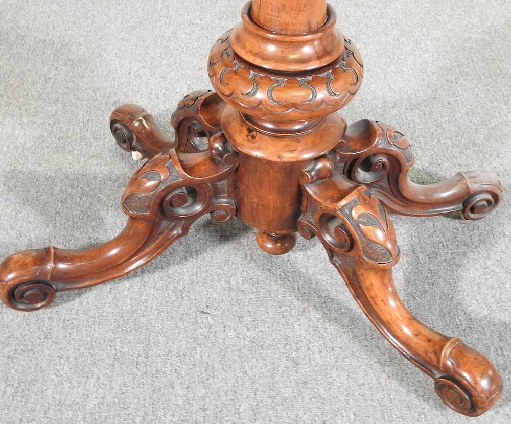 A Victorian burr walnut folding card table, the hinged rectangular top, on a carved column and - Image 4 of 4